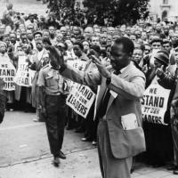 ANC supporters pray in front of the Johannesburg courthouse on Dec. 28, 1956