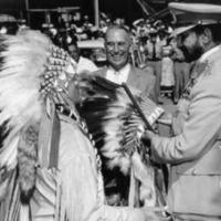 Haile Salassie recieves bonnet from Acee Blue Eagle - Oaklahoma June 18, 1954